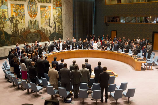 [The UN Security Council holds a moment of silence in honour of the victims of crashed flight MH17. UN Photo/Loey Felipe]