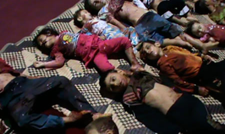 The bodies of children whom anti-government protesters say were killed by government security forces lie on the ground in Huola, near Homs May 26, 2012. (Photo: Reuters)
